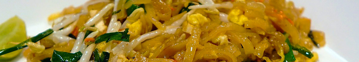 Eating Thai at Yummy Thai restaurant in New York, NY.